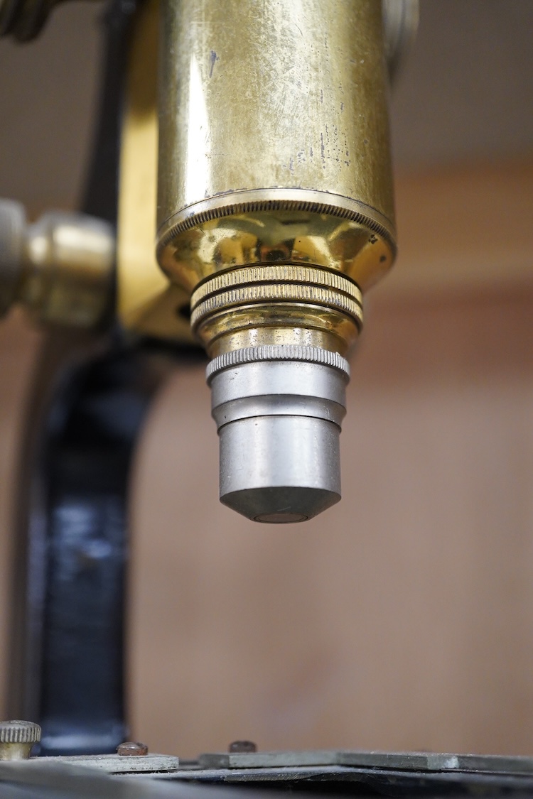 A late 19th century brass and cast iron microscope by Hearson, London, with engraved serial number; 278, approximate height 34cm